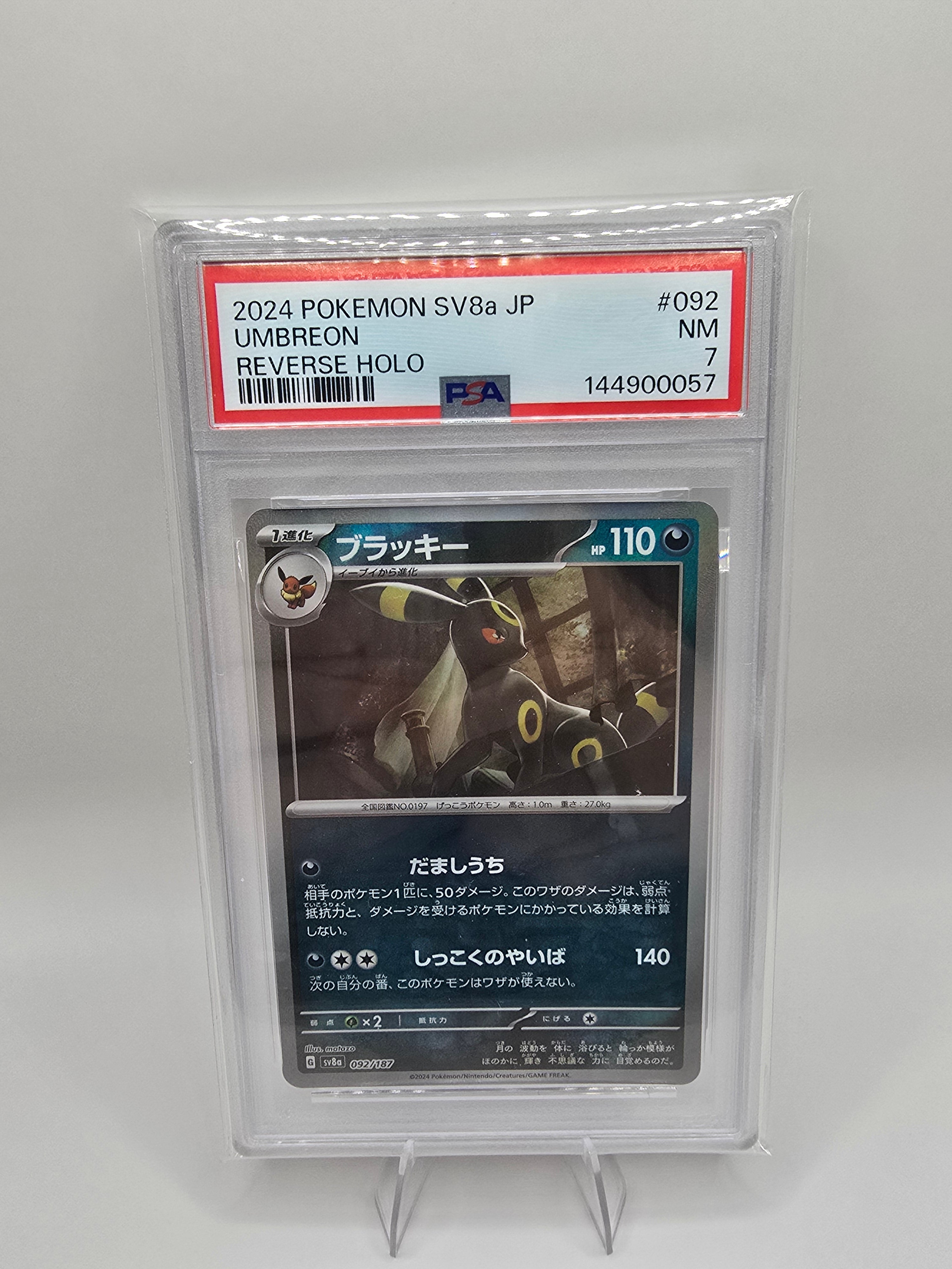 PSA 7 UMBREON REVERSE HOLO