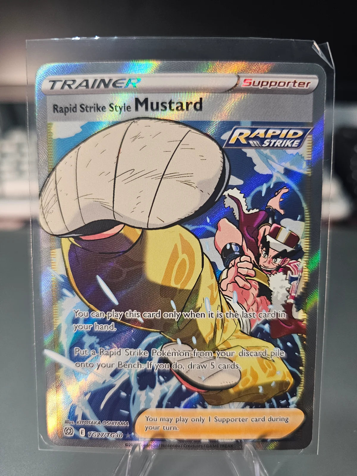 Rapid Strike Style Mustard TG27/TG30 · Holofoil (Brilliant Stars Trainer Gallery)