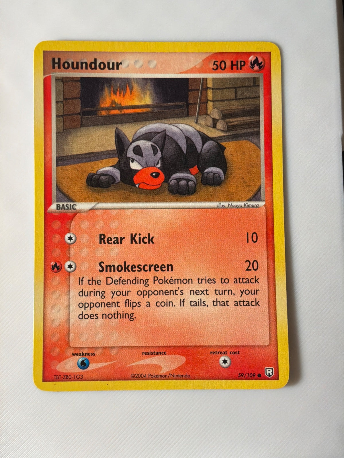 Houndour (59) · Normal (EX Team Rocket Returns)