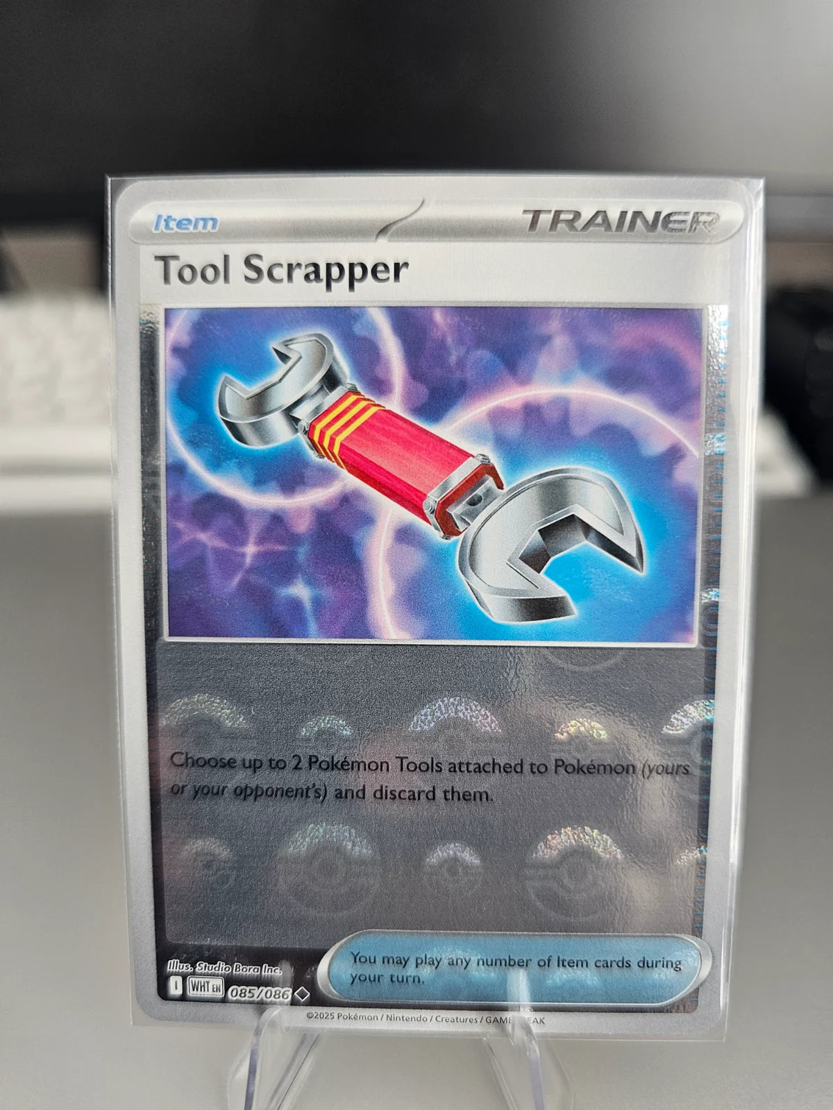 Tool Scrapper (Poke Ball Pattern) 085/086 · Holofoil (White Flare)