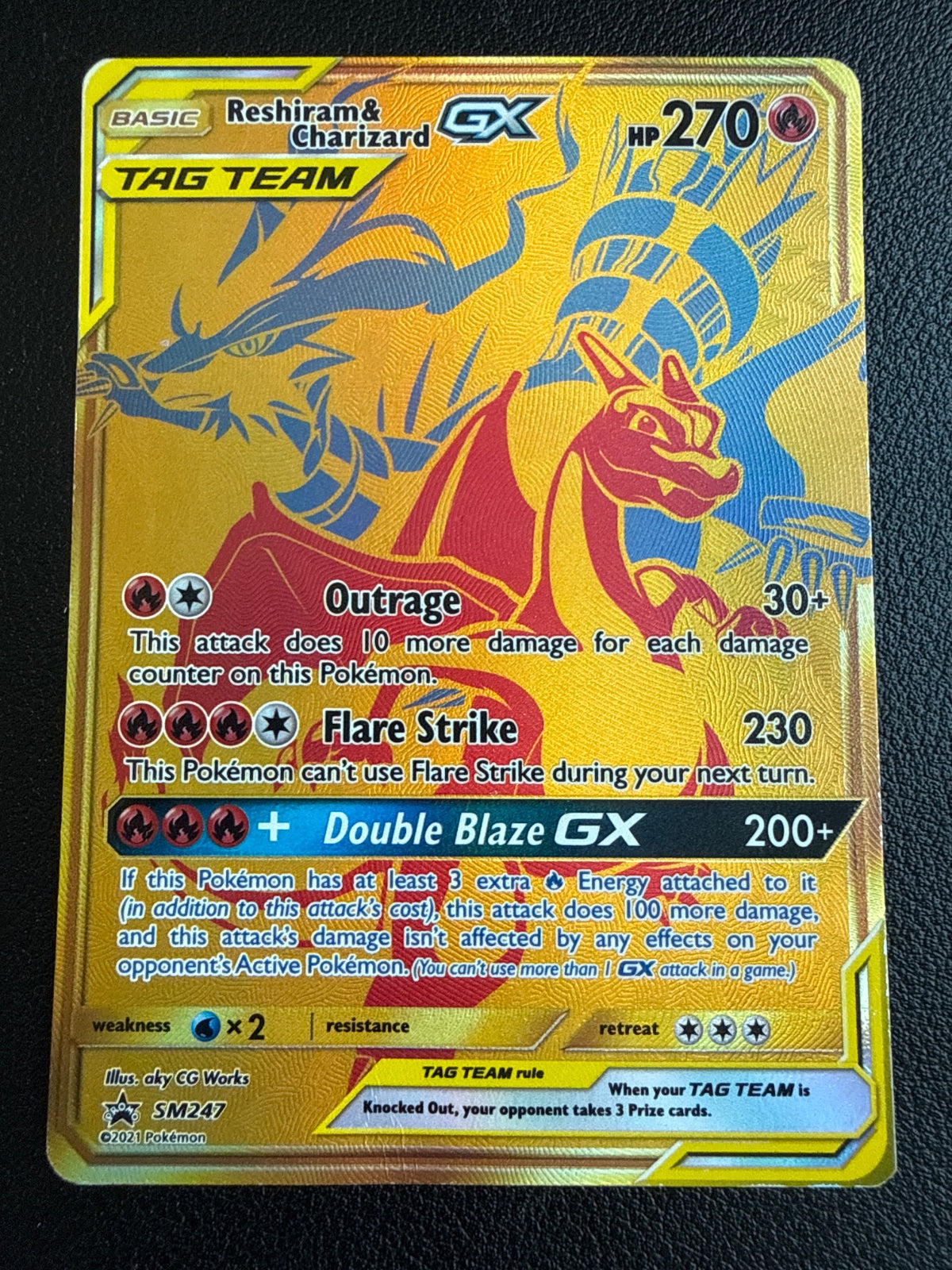 Reshiram & Charizard GX SM247 · Holofoil (Sun & Moon Promo)