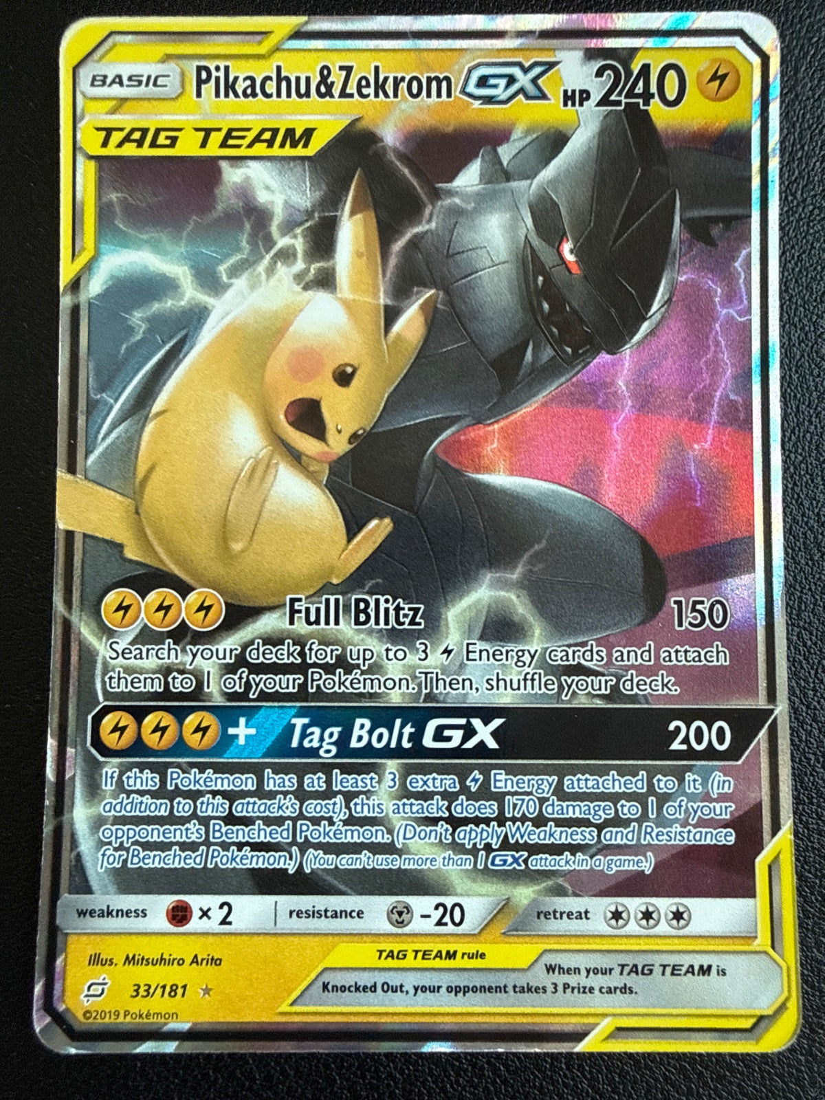 Pikachu & Zekrom GX 33 · Holofoil (Team Up)