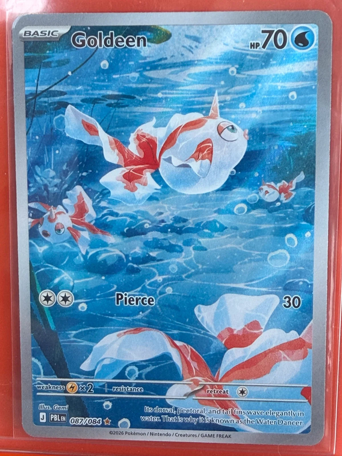 Goldeen 087/084 · Holofoil (Pitch Black)