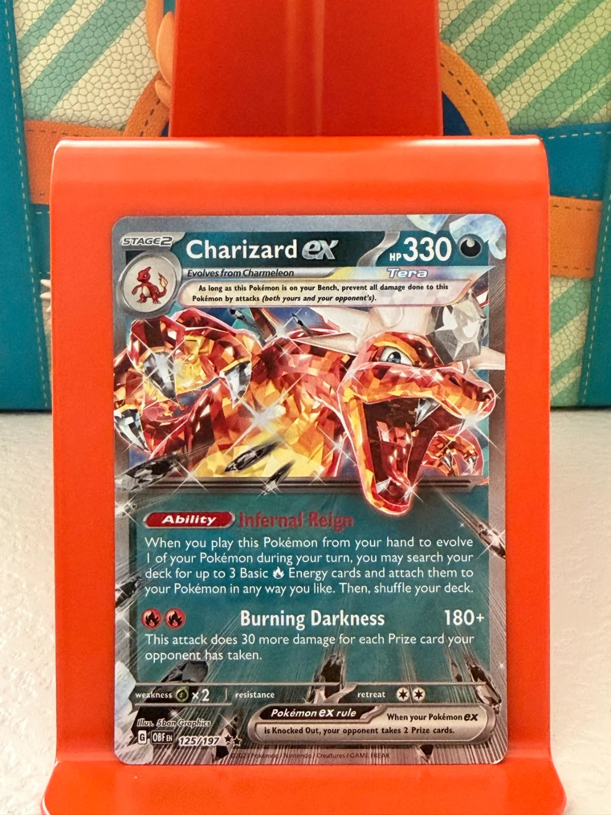 Charizard ex 125/197 · Holofoil (Obsidian Flames)
