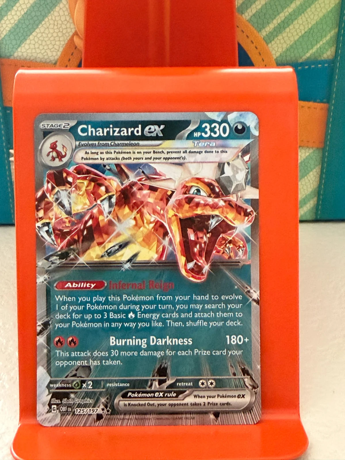 Charizard ex 125/197 · Holofoil (Obsidian Flames)