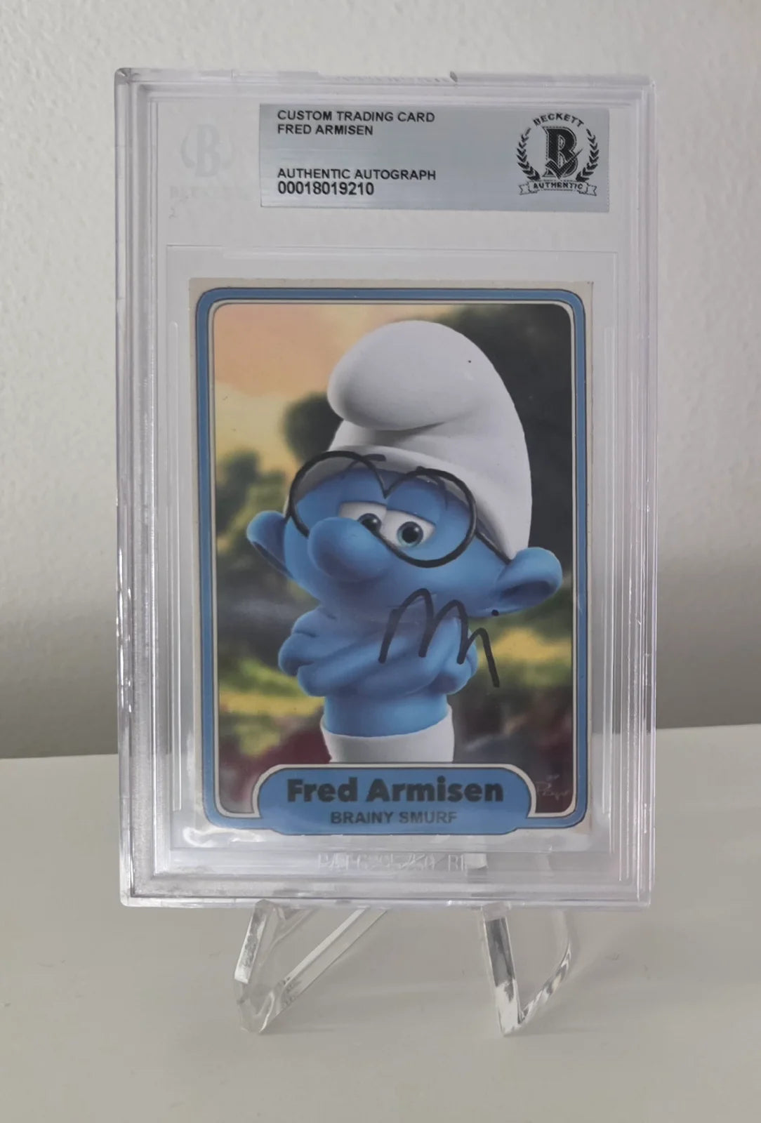 Brainy Smurf signed by Fred Armisen  "the voice behind Brainy" Beckett certified