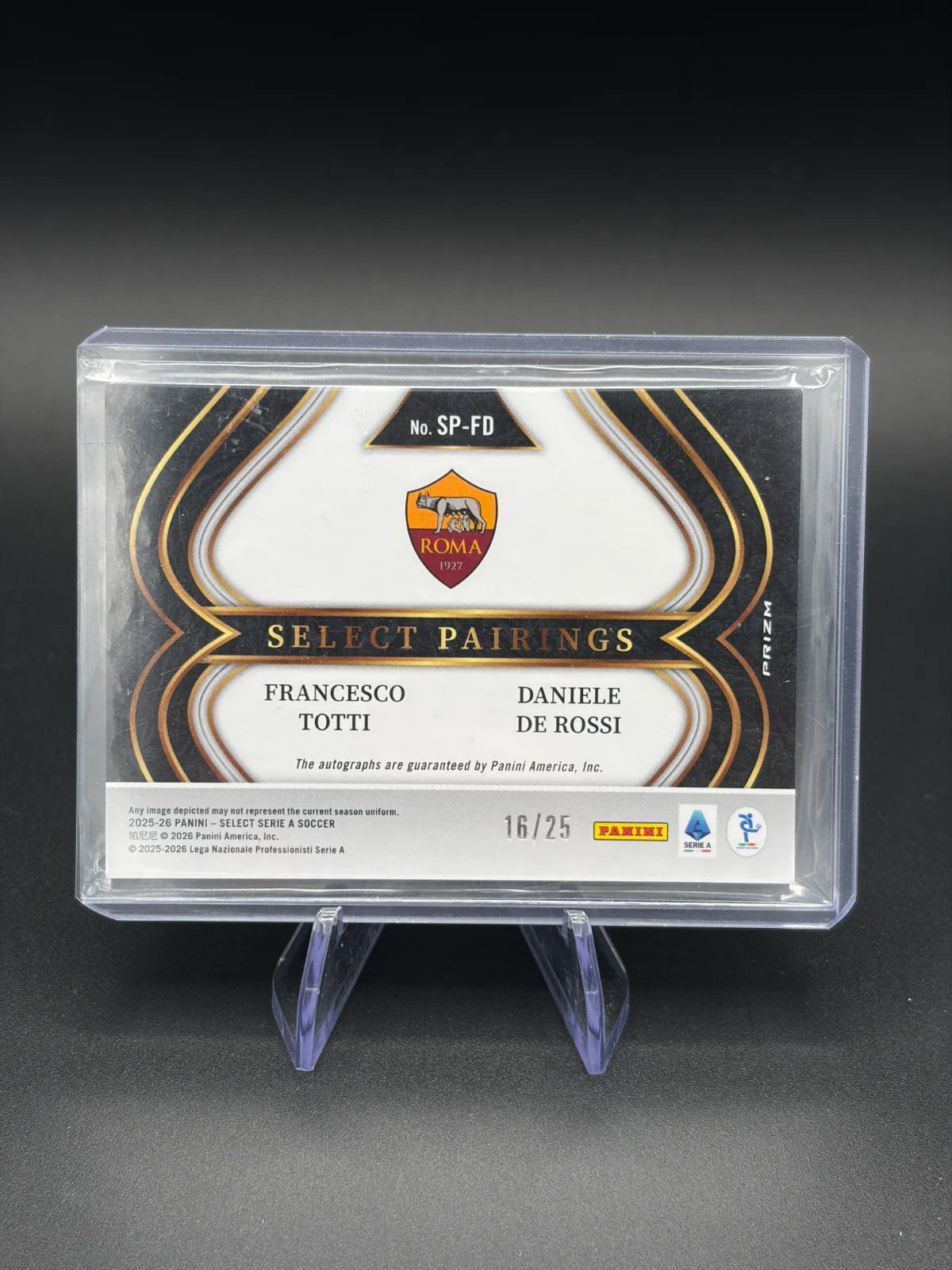 2025-26 Panini Select Serie A Francesco Totti / Daniele De Rossi Select Pairings Dual Auto Orange 16/25 #SP-FD AS Roma