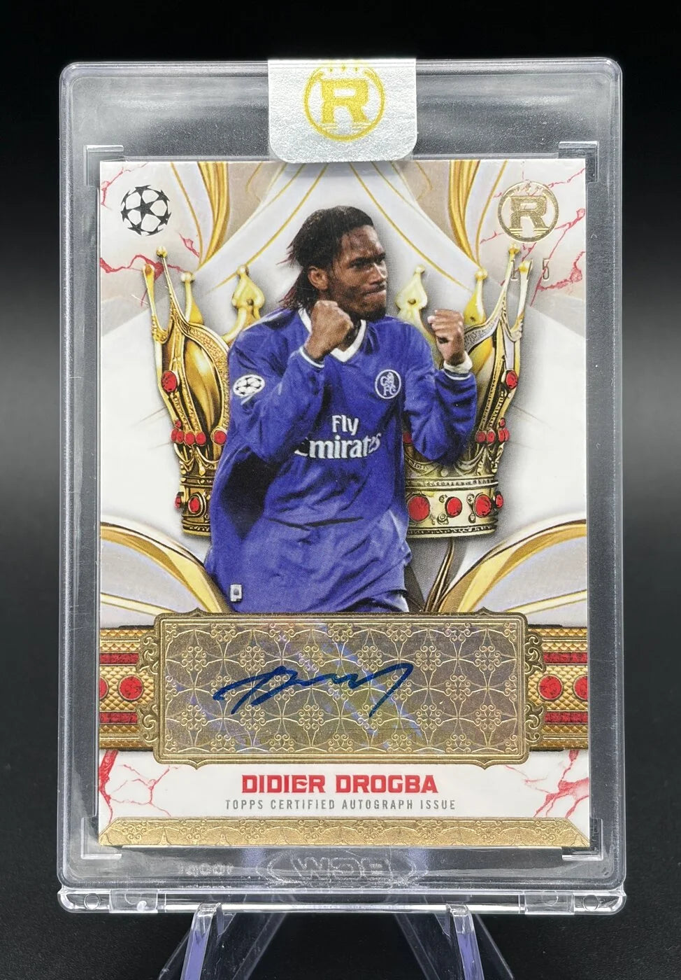 2024-25 Topps Reverence UCC Didier Drogba Crowned Legend Auto Red 1/5 First On Print #CLA-DD Chelsea