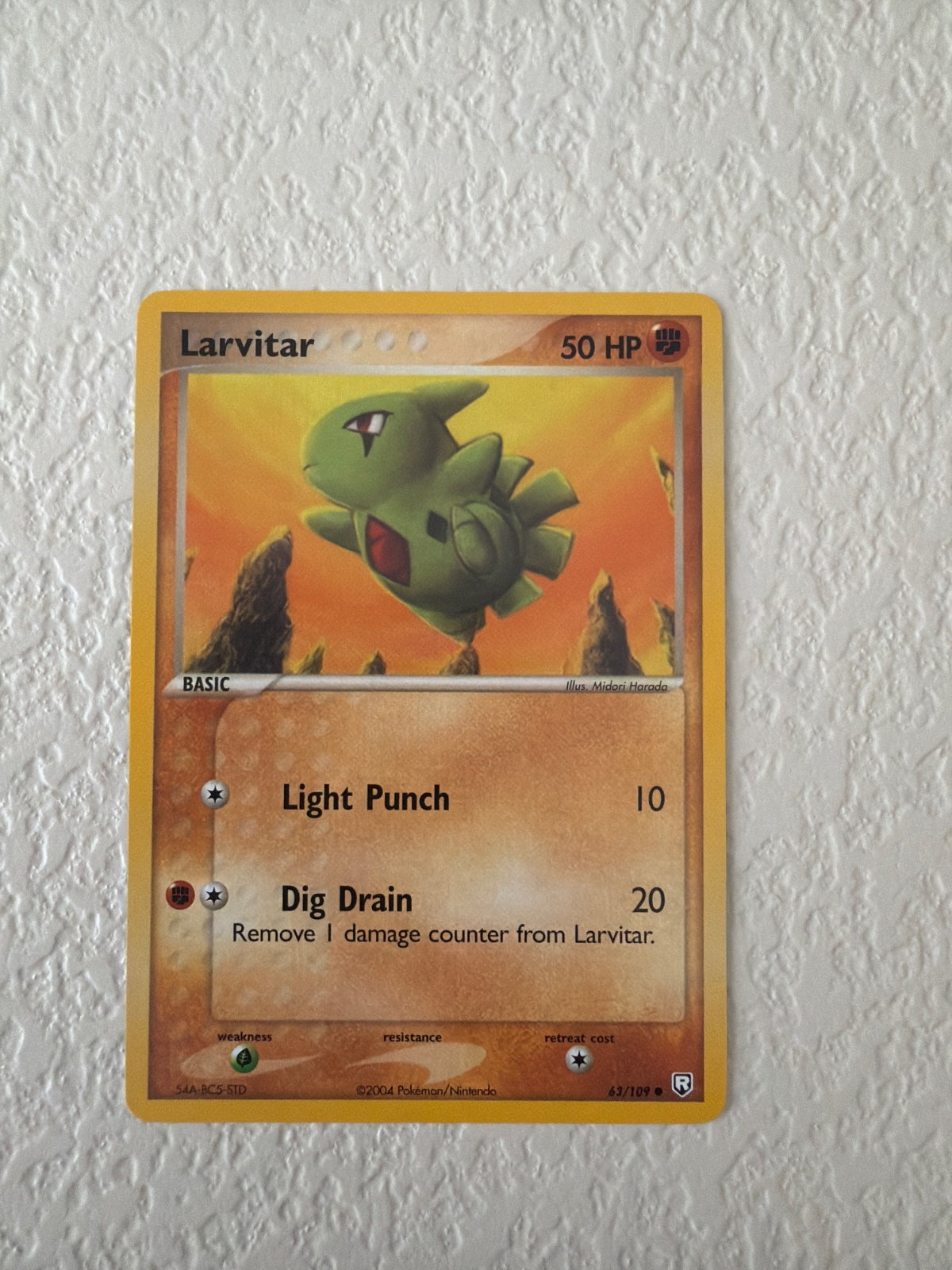 Larvitar (63) · Normal (EX Team Rocket Returns)