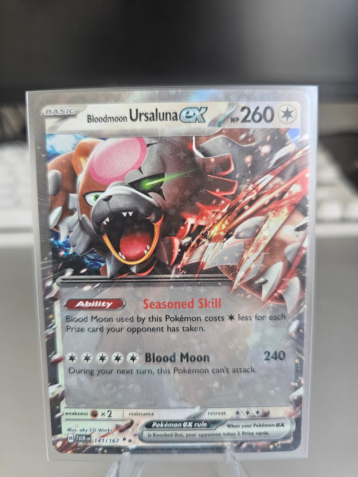 Bloodmoon Ursaluna ex 141/167 (Twilight Masquerade)