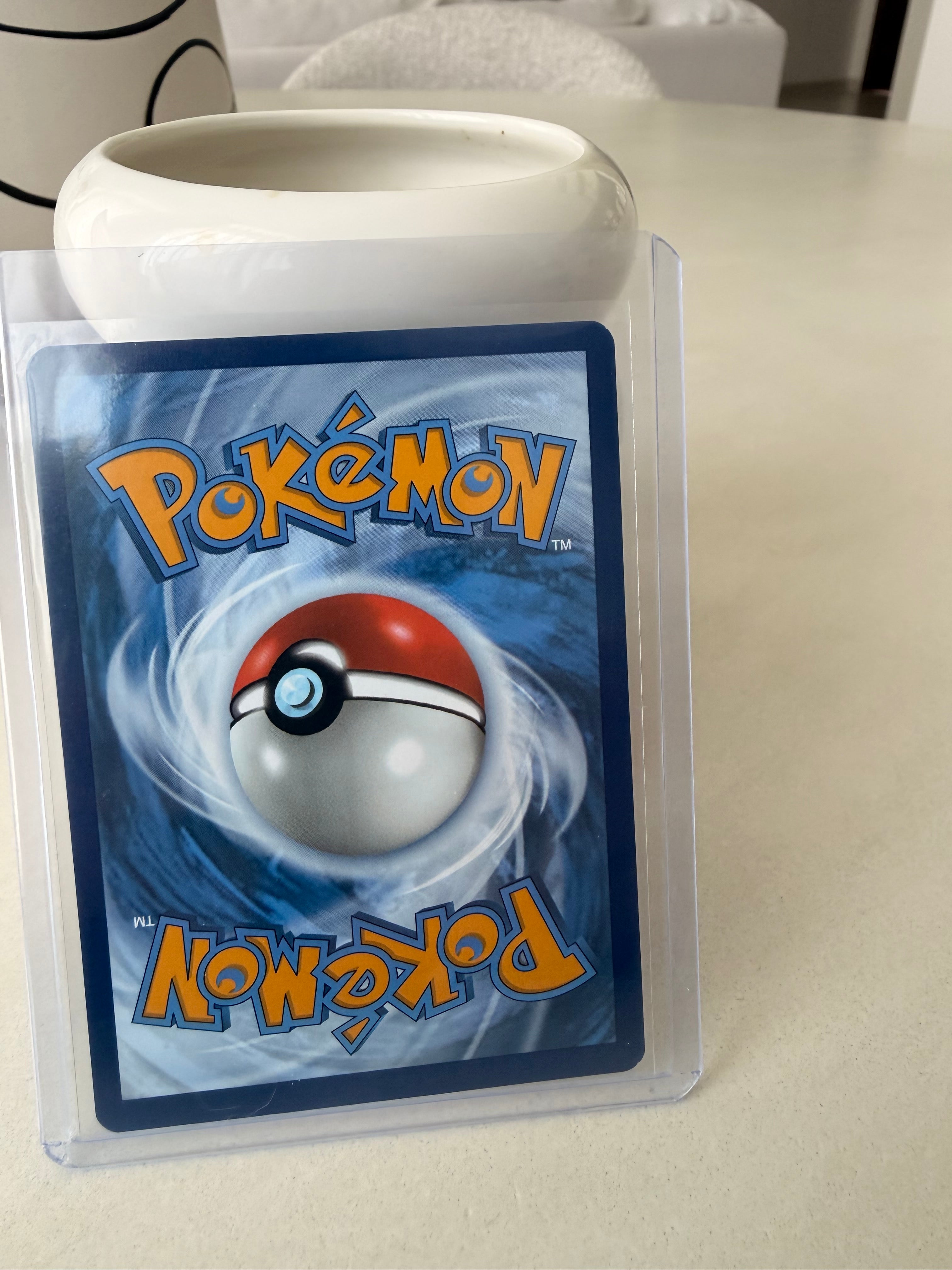 Charizard ex 125 · Holofoil (Obsidian Flames)
