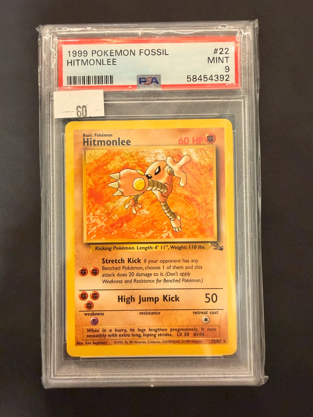 Hitmonlee (22) · Unlimited (Fossil) — PSA 9