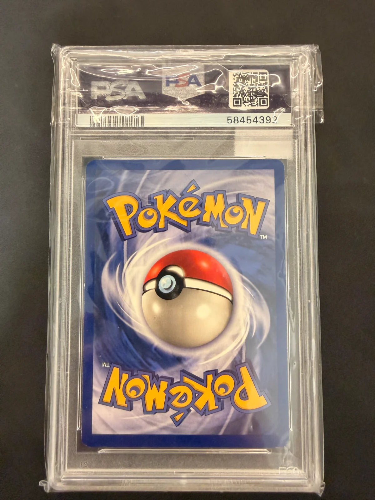 Hitmonlee (22) · Unlimited (Fossil) — PSA 9