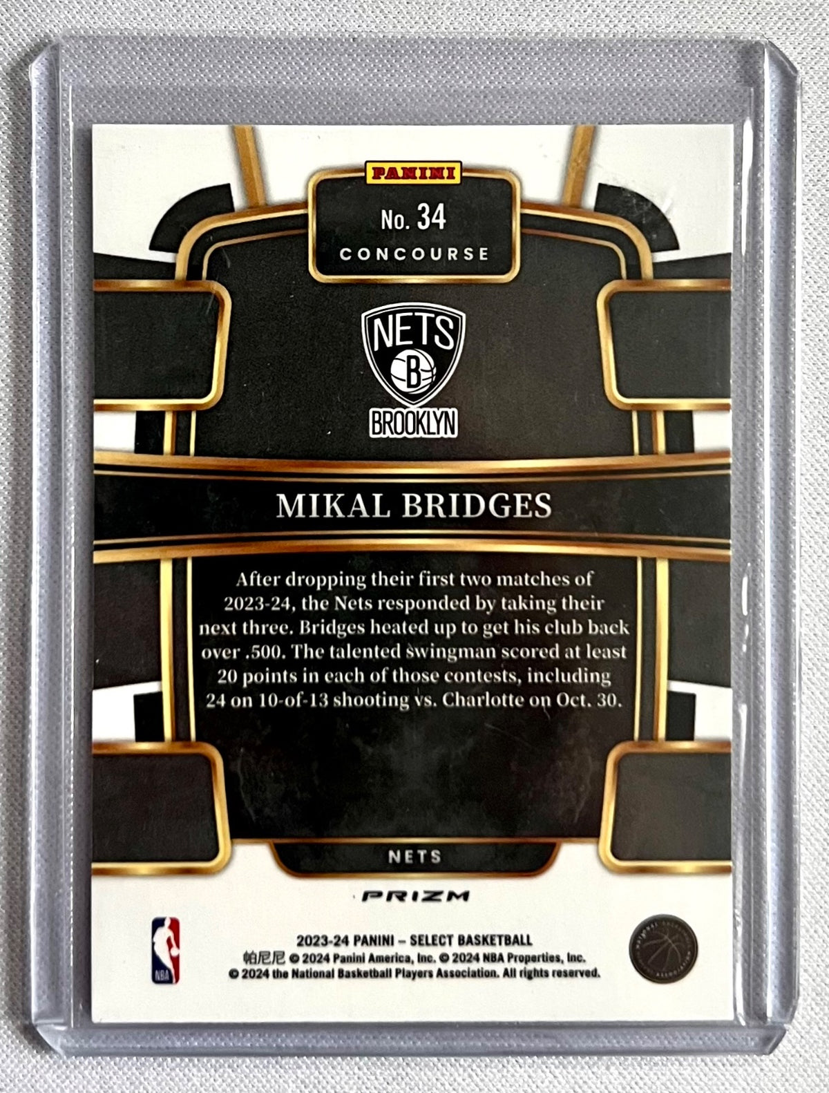 2023-24 Panini Select Concourse Red Cracked Ice Prizm Mikal Bridges #34