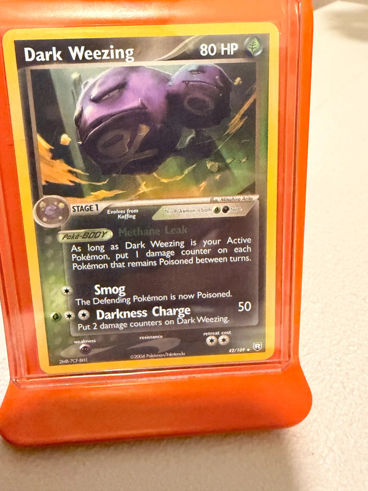 Dark Weezing 42 · Normal (EX Team Rocket Returns)