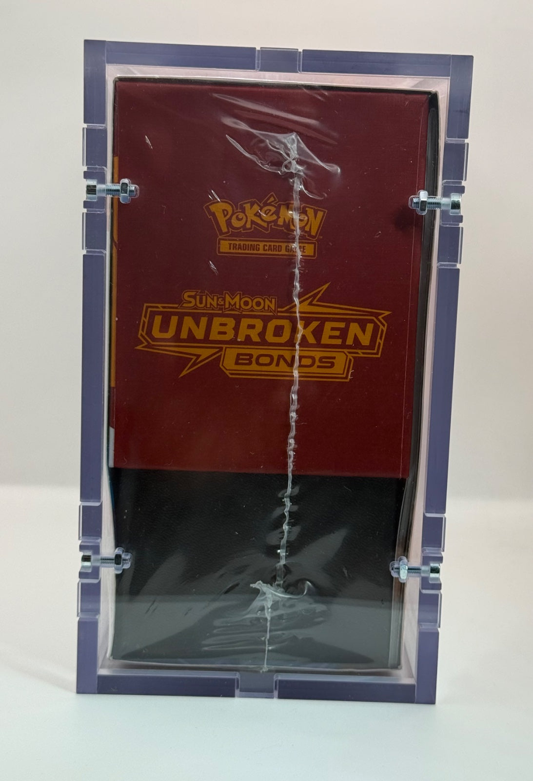 Unbroken Bonds Elite Trainer Box · Elite Trainer Box (ETB) w/ high quality acrylic