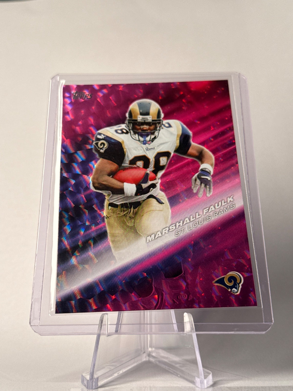 2026 Topps Marshall Faulk #GOTG-26 Greats of the Game Pink Crackle Foil – Rams