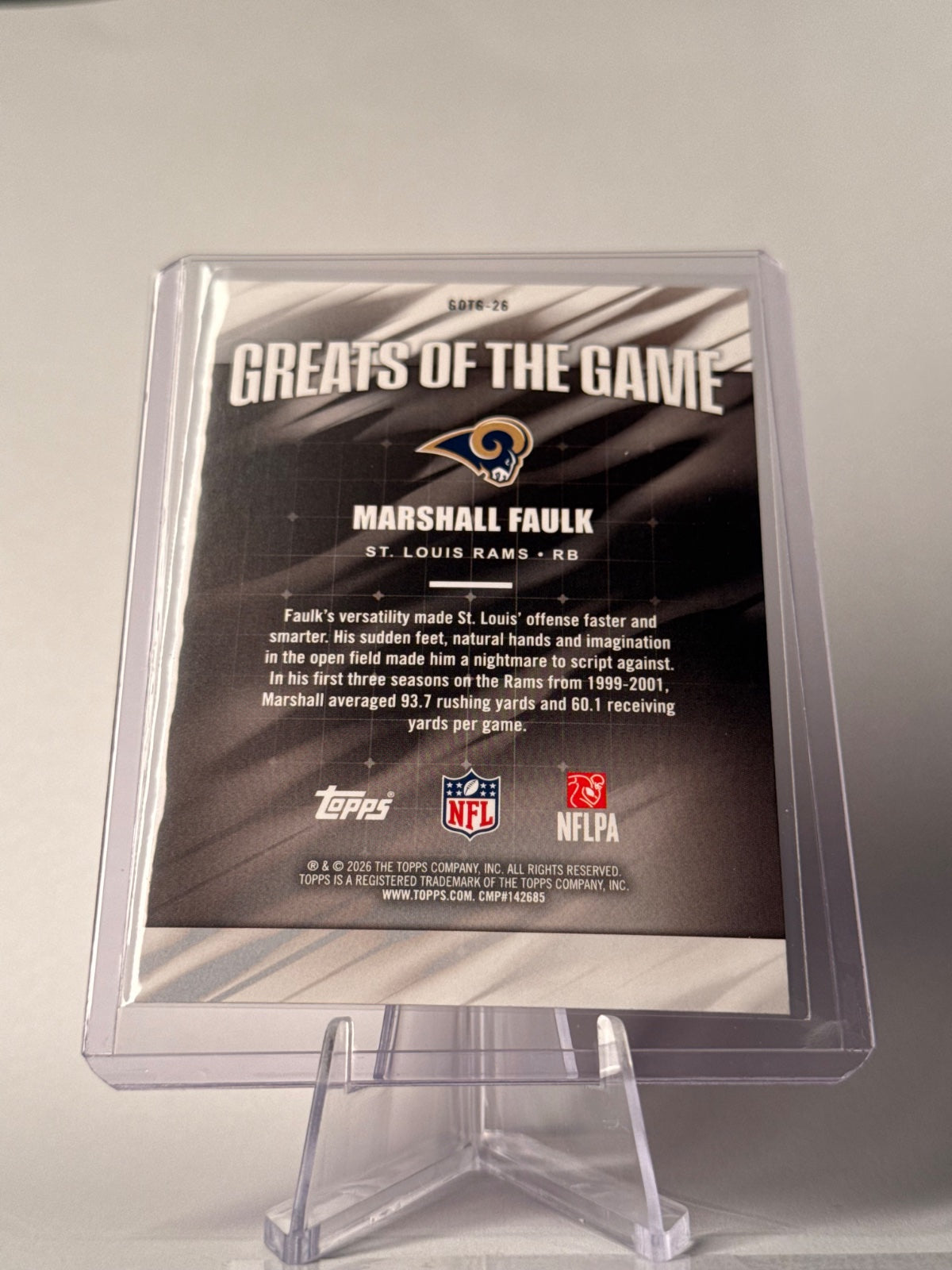 2026 Topps Marshall Faulk #GOTG-26 Greats of the Game Pink Crackle Foil – Rams