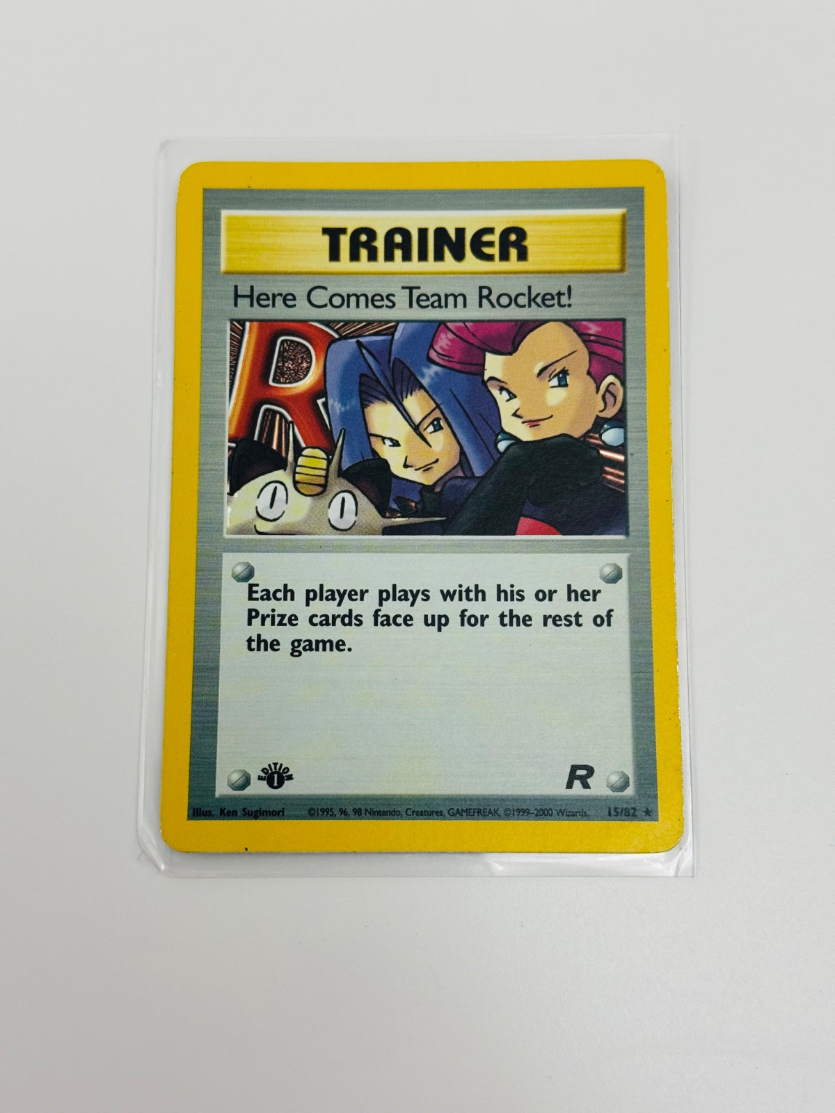 Here Comes Team Rocket! (15) · 1st Edition Holofoil