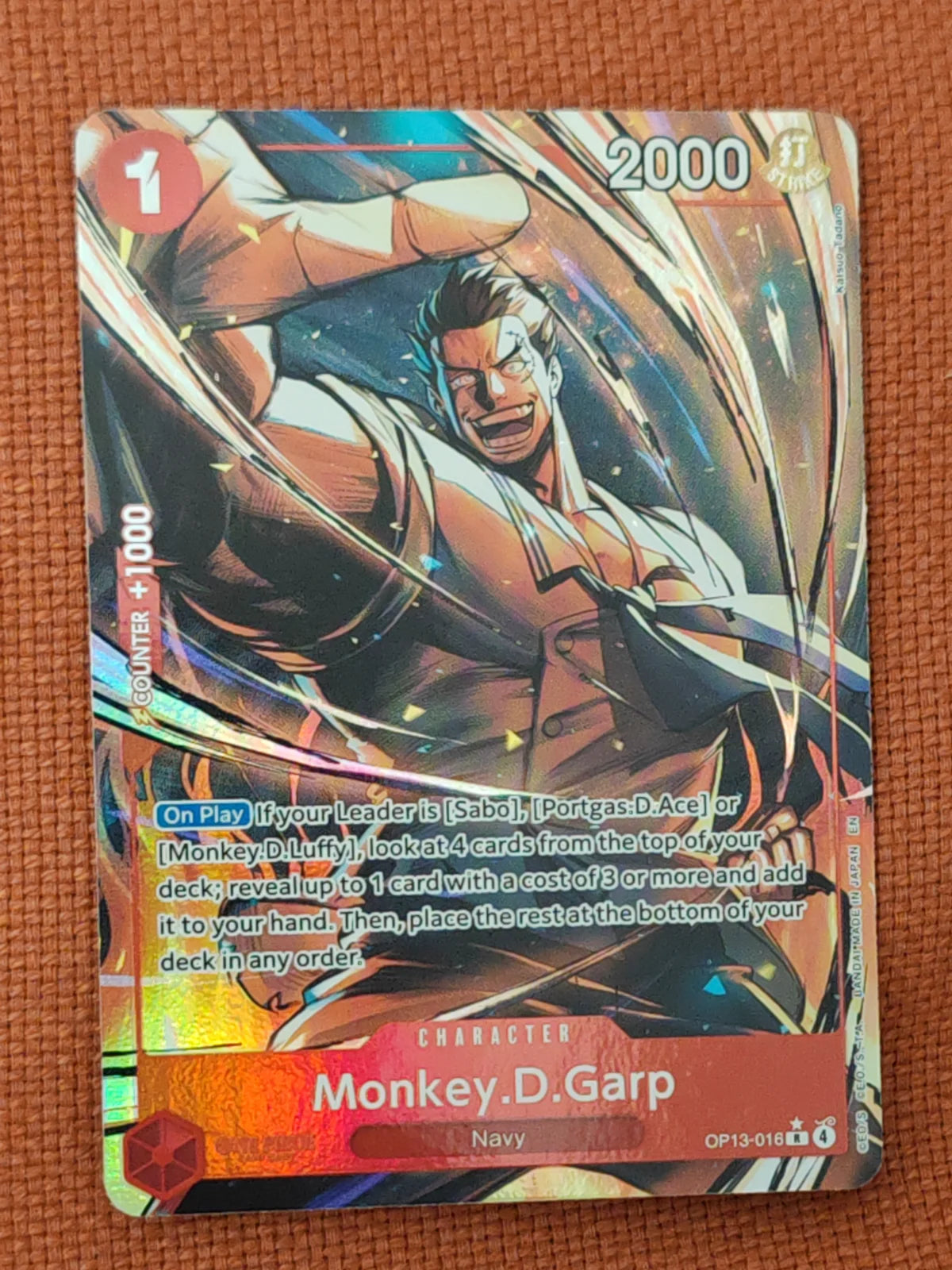 Monkey.D.Garp (Alternate Art) OP13-016 (Carrying On His Will)