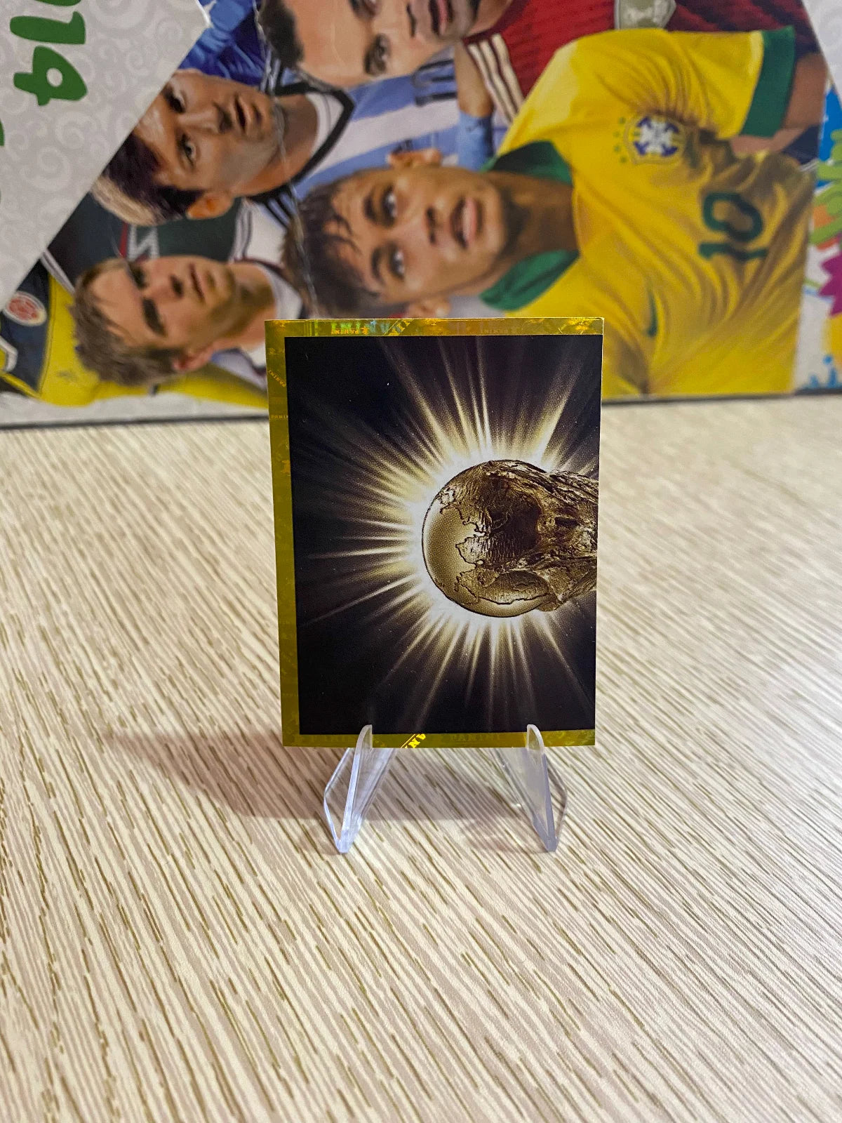 2022 Panini FIFA World Cup: Qatar 2022 Stickers (Orange Fronts, Pink Backs, Made in Italy) - #FWC2 FIFA World Cup Trophy