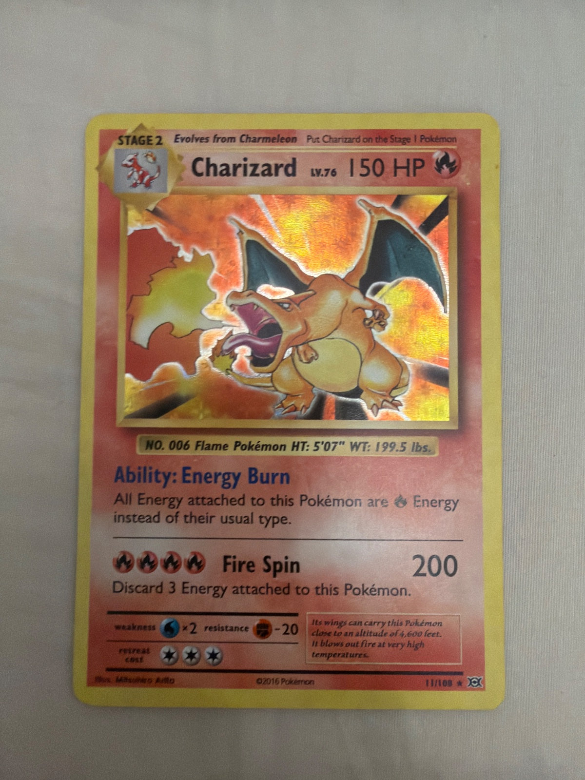 Charizard 11/108 · Holofoil (Evolutions)