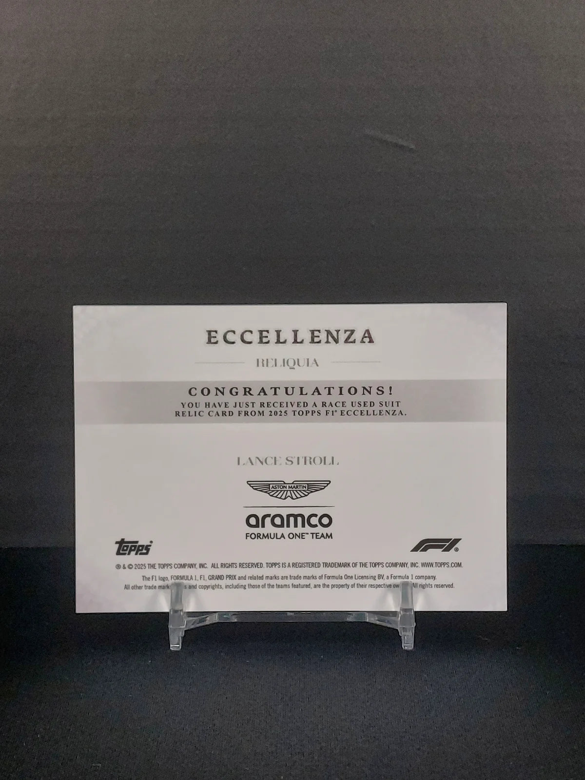 LANCE STROLL (RU MEM) - 2025 Topps F1 Eccellenza, Reliquia RU Relic