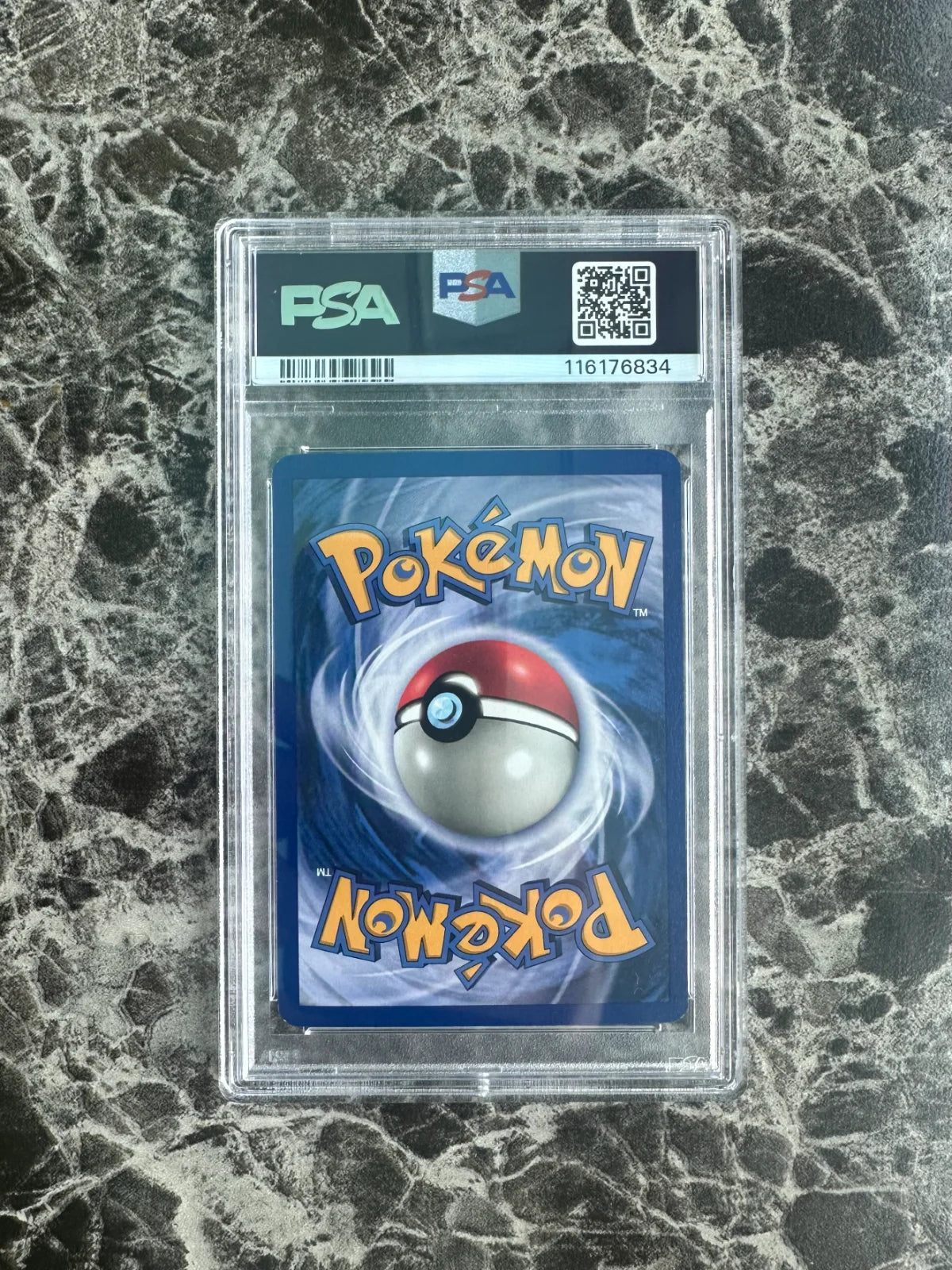 Hitmonlee 7 · 1st Edition Holofoil (Fossil) — PSA 7