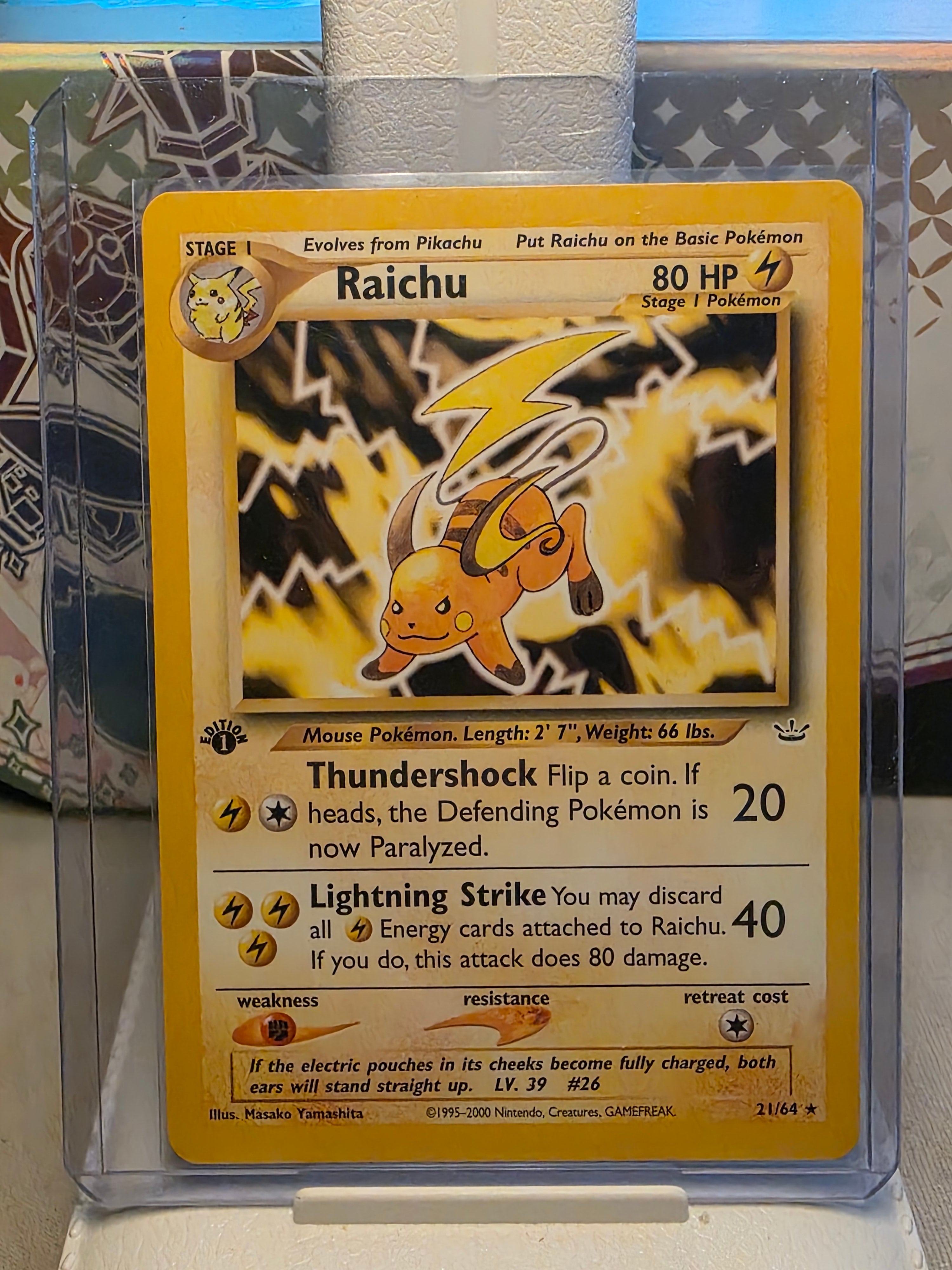 Raichu (1st edition) 21/64 - Neo Revelation
