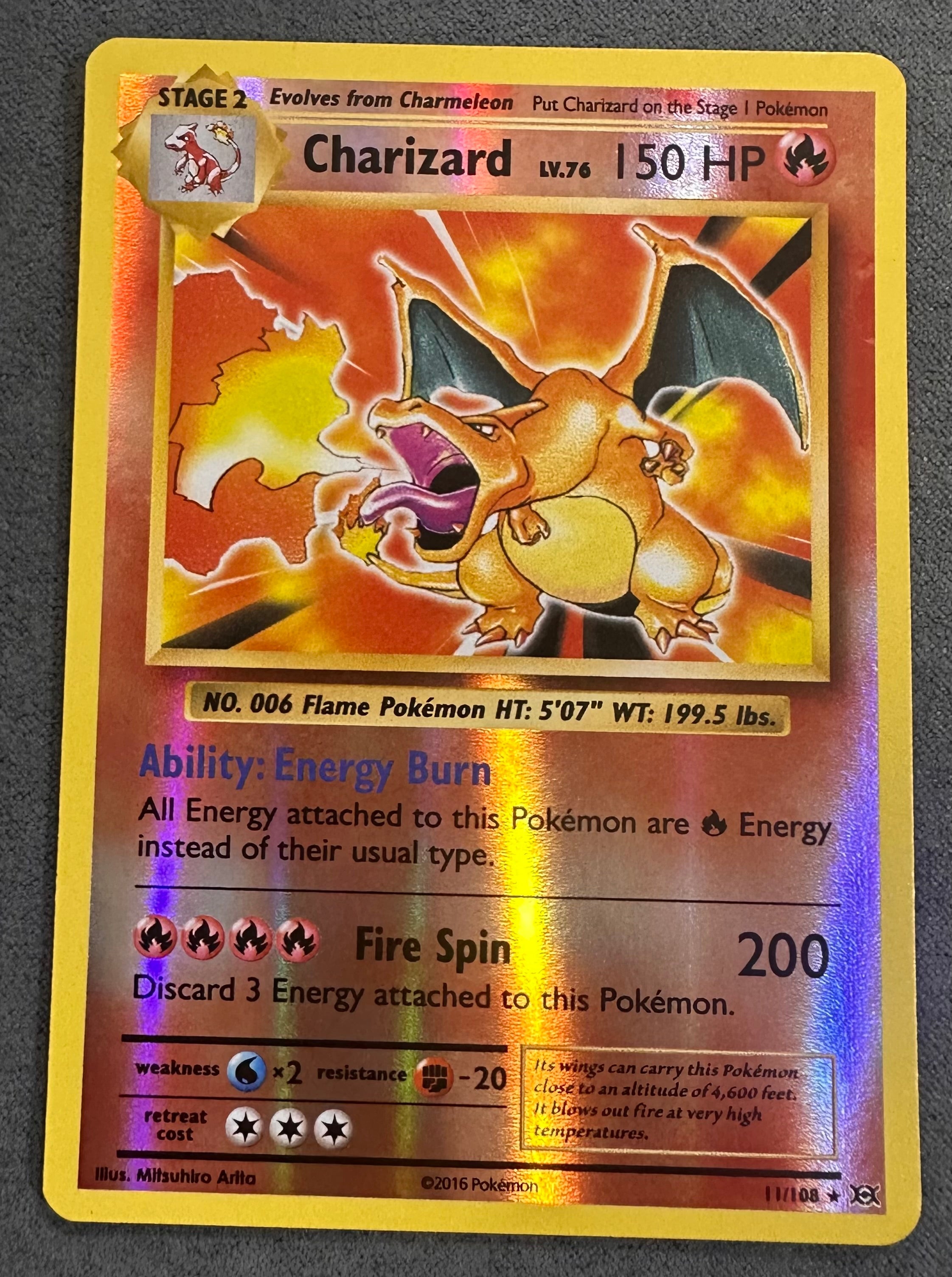 تشارizard 11/108 XY Evolutions 2016 عكسي هولو نادر بوكيمون تي سي جي بحالة NM