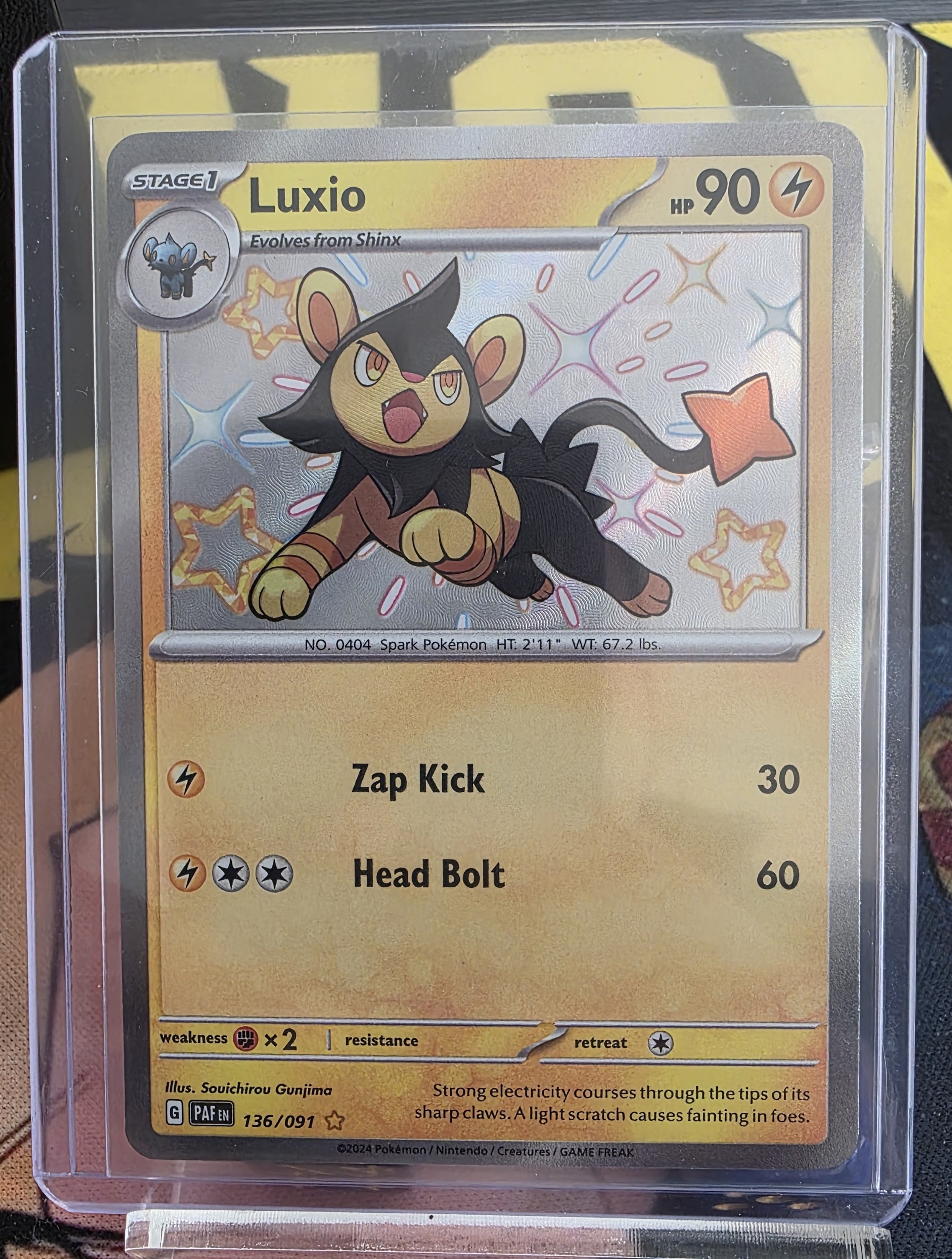 Luxio (Shiny Rare) 136/091 - Paldean Fates