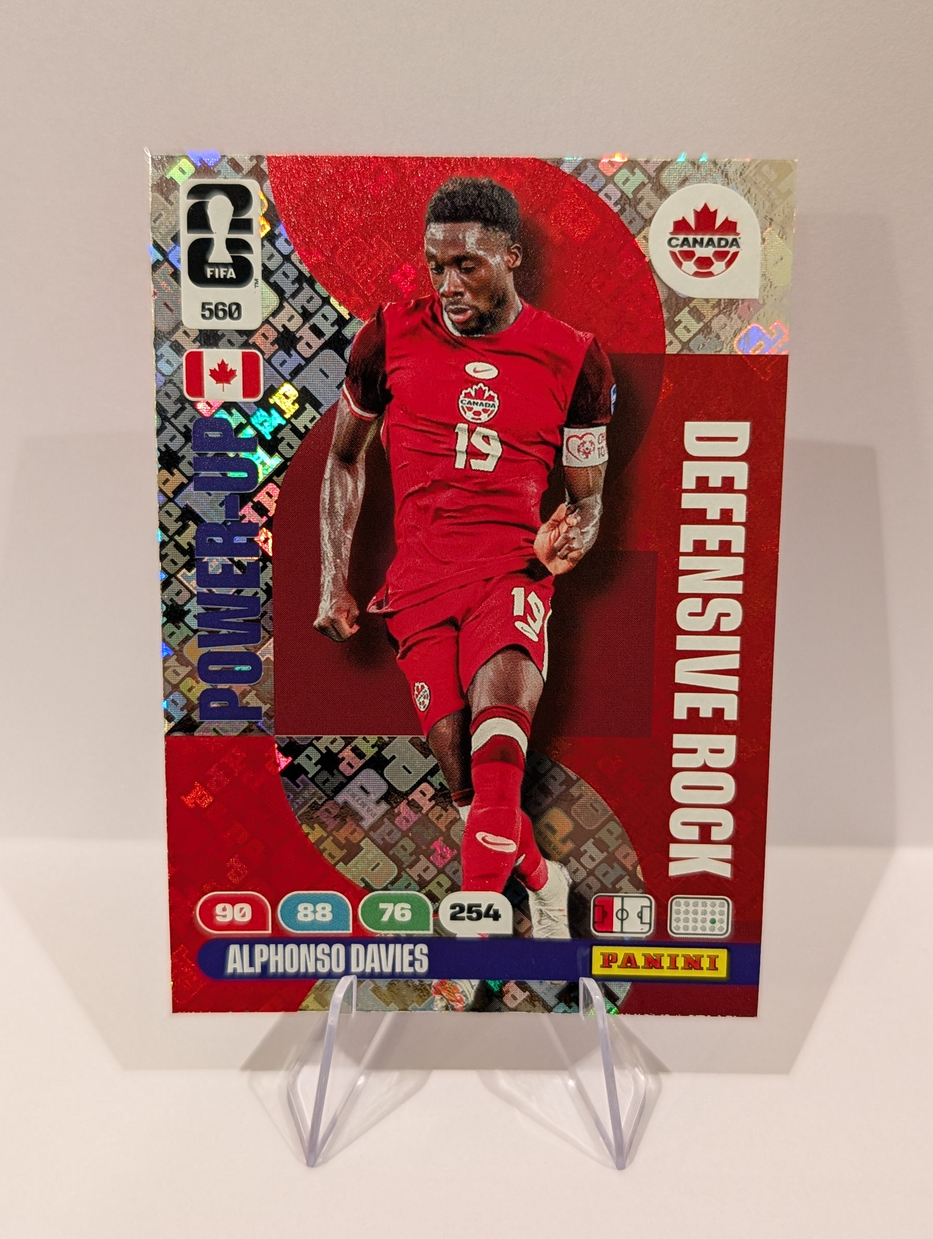 560 Alphonso Davies - Defensive Rock - Panini Adrenalyn XL World Cup 2026